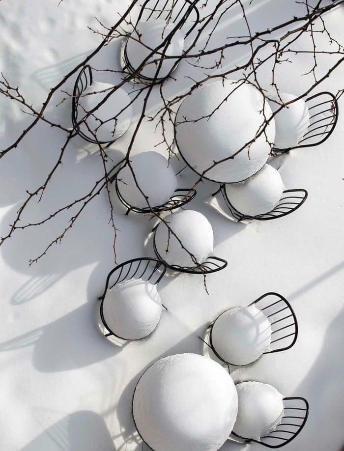 These Snow Covered Chairs Look Like Mothballs During Winter
