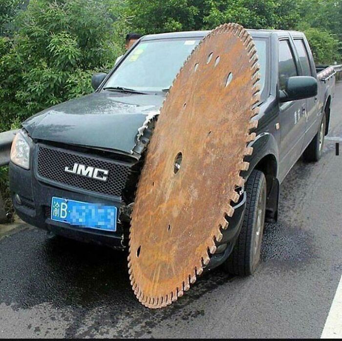 Let’s Just Ignore The Gigantic Saw For A Second And Focus On The Junior Motors Truck Company Logo