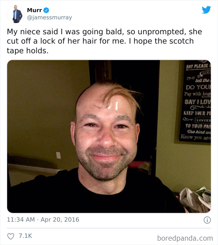 Man with a lock of child’s hair taped to his bald head showing funny kids are not born smart moment.