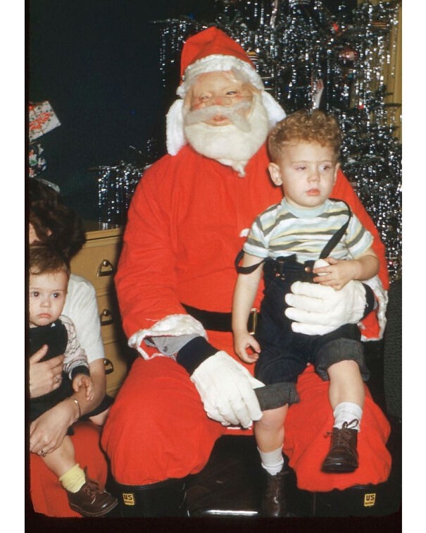 This Picture Was Taken In About 1952. The Boy Sitting On The Lap Of ‘Santa’ Is My Husband’s Cousin, Teddy. ‘Santa’ Is ‘Uncle Bob’ Who Apparently Didn’t Notice That His Mask Was Melting Off. My Husband Thankfully Doesn’t Remember Any Of This. No Word If Little Teddy Ever Recovered From The Trauma