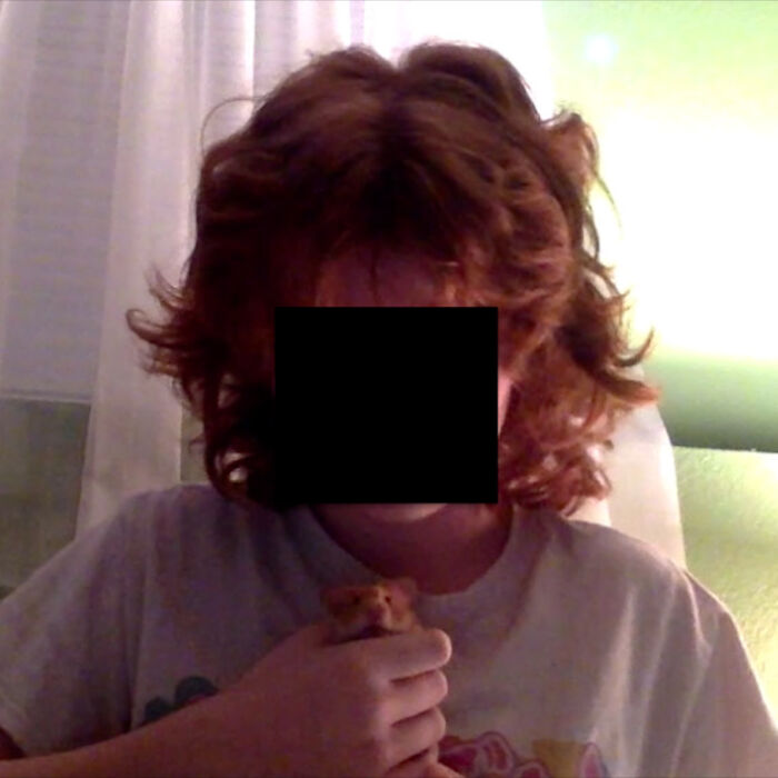 My Stinky Little Hamster Son While Trying To Wiggle His Way Out Of My Hands And Onto The Bed (Covering Up My Face Because I Look Gross)