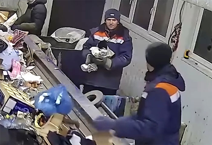 Worker Rescues Cat In A Bag Only Seconds Away From It Being Crushed By Garbage Machine