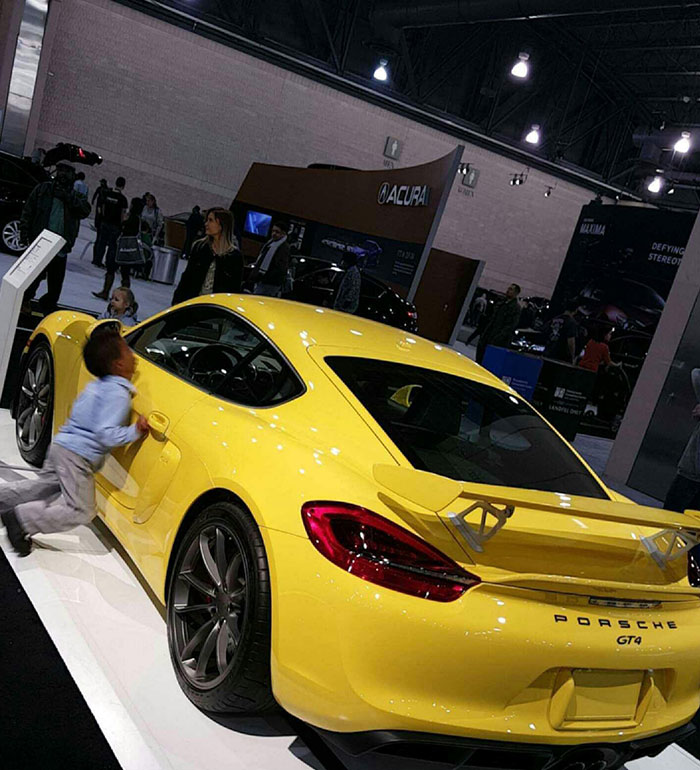 My Favorite Photo I've Ever Taken Is Of A Kid Tripping Into $100k Car