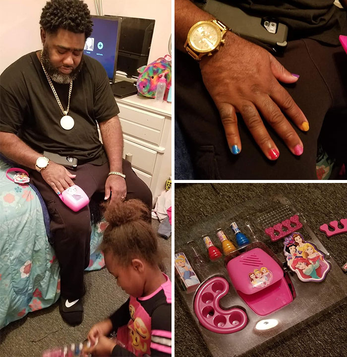 Dad with colorful painted nails after a visit to daughters beauty salon playset, sitting and smiling in a cozy room.