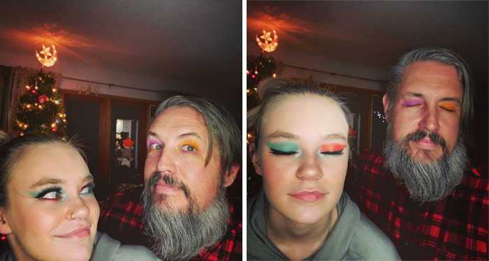 Dad and daughter showing colorful makeup after a visit to their daughters beauty salon at home with Christmas tree background.