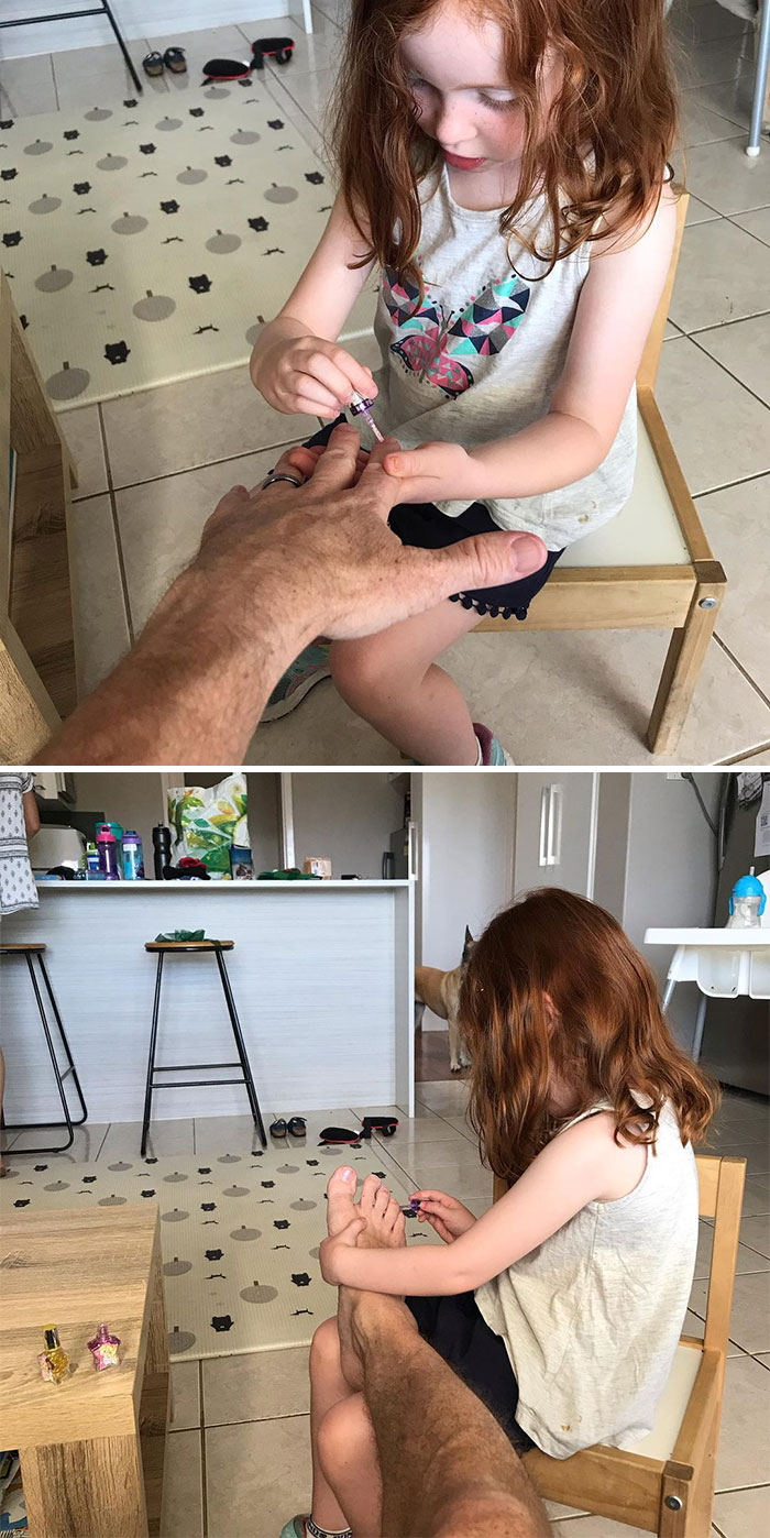 Little girl painting her dad’s nails at home, a charming moment from dads after a visit to their daughters beauty salons.