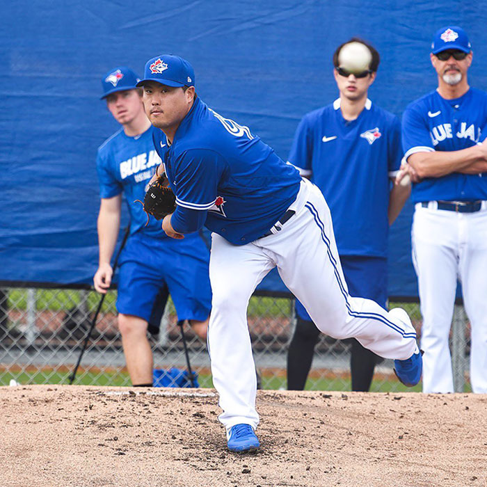 Player In The Background With Interesting Hairline
