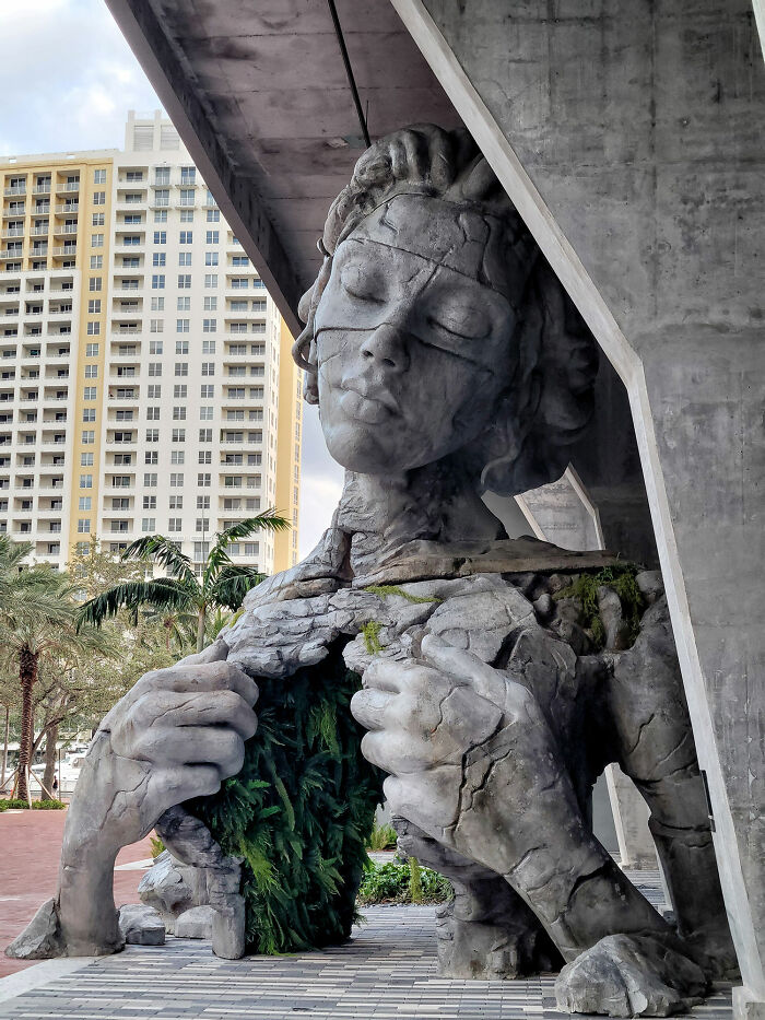 Giant Sculpture Of A Woman Opening Her Chest To Reveal A Fern-Covered Tunnel Appears In Florida Giant Sculpture Of A Woman Opening Her Chest To Reveal A Fern-Covered Tunnel Appears In Florida