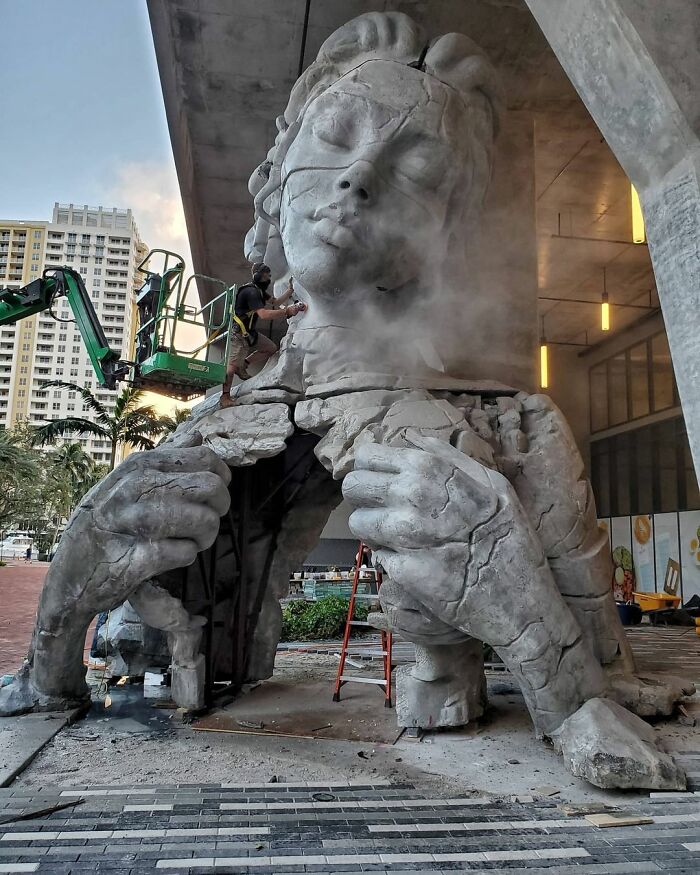 Giant Sculpture Of A Woman Opening Her Chest To Reveal A Fern-Covered Tunnel Appears In Florida