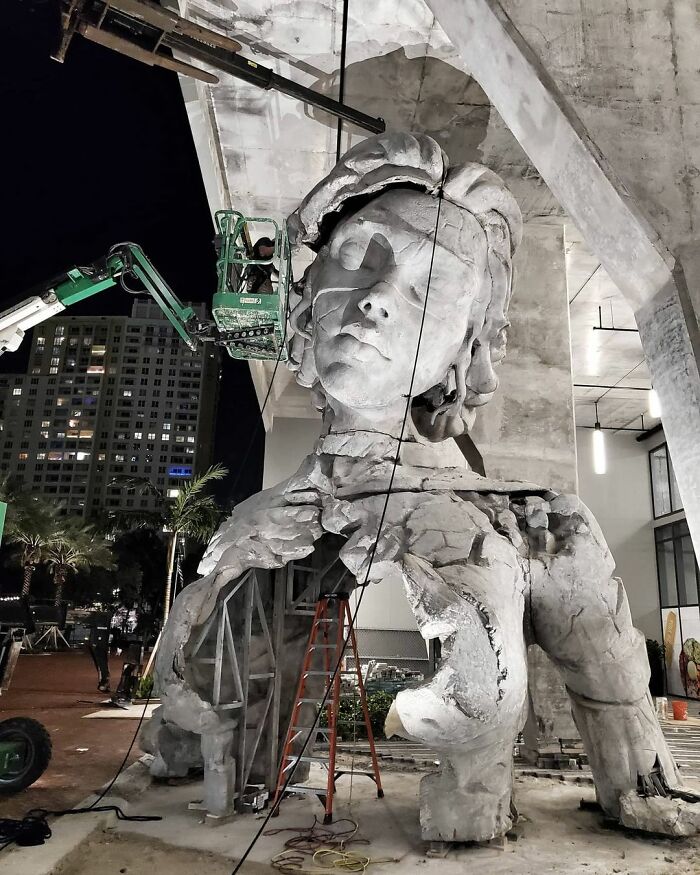 Giant Sculpture Of A Woman Opening Her Chest To Reveal A Fern-Covered Tunnel Appears In Florida