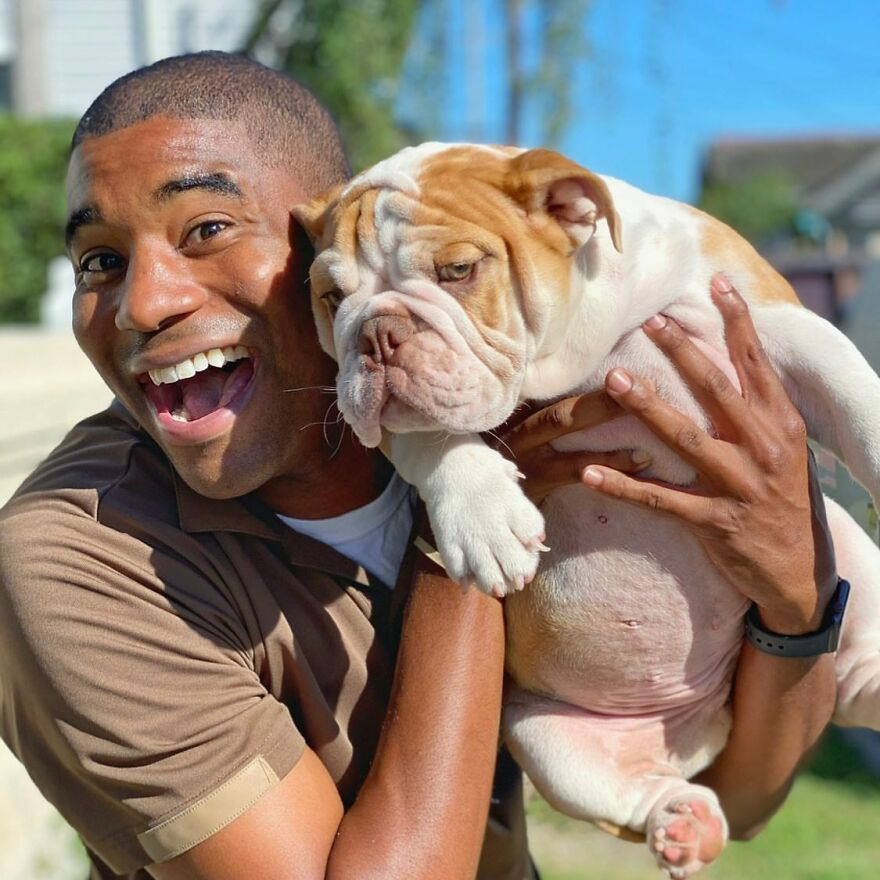 Delivery Man Continues To Take Breaks On The Way To Take Pictures And Pet The Dogs He Meets (New Pics)