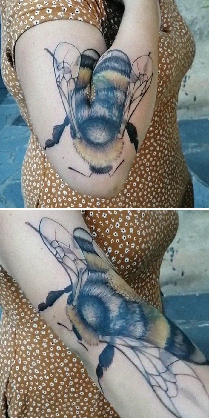 Creative tattoo of a bee on an arm, transforming with body movement.