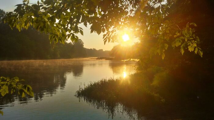 Hanging Out Next To The River With Friends