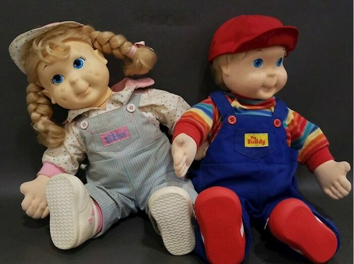 This Scared The Living Hell Out Of Me! I Don't Have A Photo Of The Commercial So I Found A Picture Of The Dolls. These Things Are Freaky As Hell! This Kind Of Reminds Me Of Chucky From Child's Play...