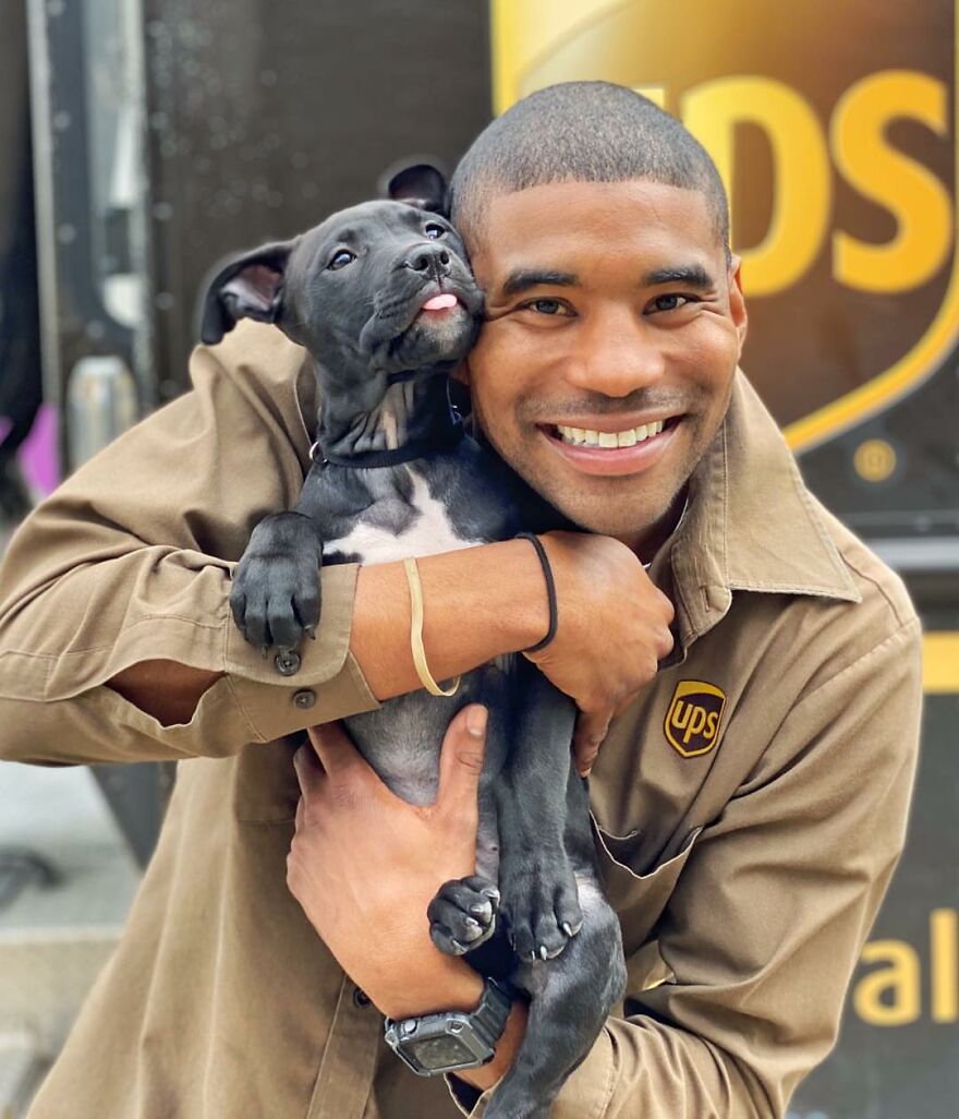 Delivery Man Continues To Take Breaks On The Way To Take Pictures And Pet The Dogs He Meets (New Pics)