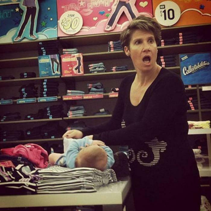 A Wild Karen Changing Her Baby’s Diaper On Top Of An Old Navy Clothing Display. “Are You Taking A Picture Of Me???”