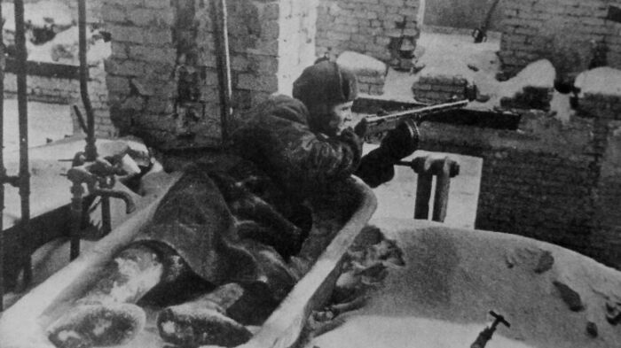 A Red Army Soldier Firing From A Bathtub During The Battle Of Stalingrad, 1942