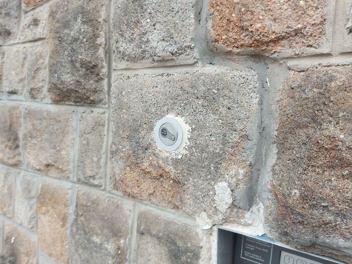 What Is This Keyhole In The Wall Next To An Outer Door?