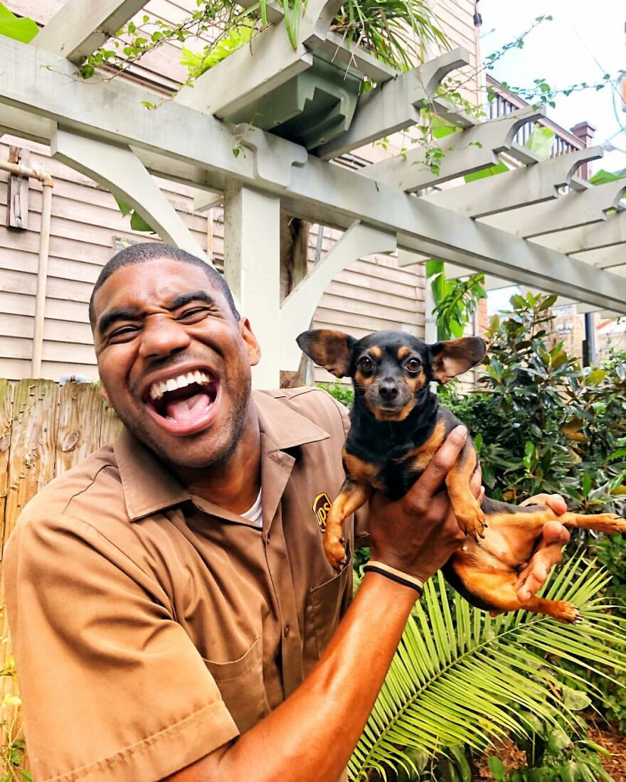 Delivery Man Continues To Take Breaks On The Way To Take Pictures And Pet The Dogs He Meets (New Pics)