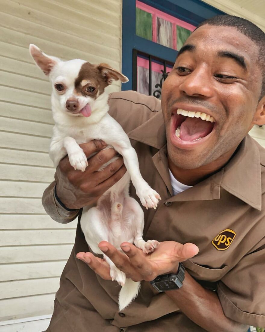 Delivery Man Continues To Take Breaks On The Way To Take Pictures And Pet The Dogs He Meets (New Pics)