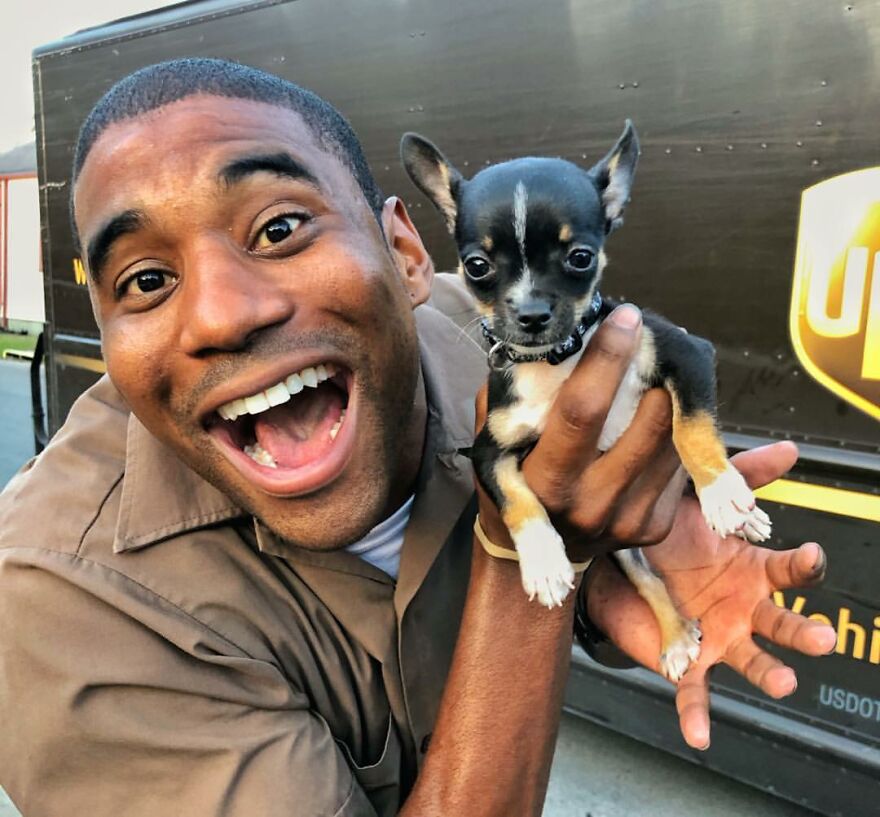 Delivery Man Continues To Take Breaks On The Way To Take Pictures And Pet The Dogs He Meets (New Pics)
