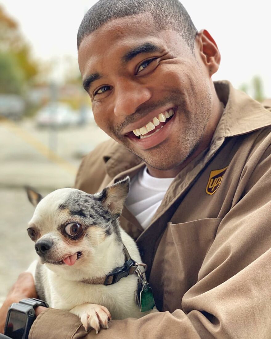 Delivery Man Continues To Take Breaks On The Way To Take Pictures And Pet The Dogs He Meets (New Pics)