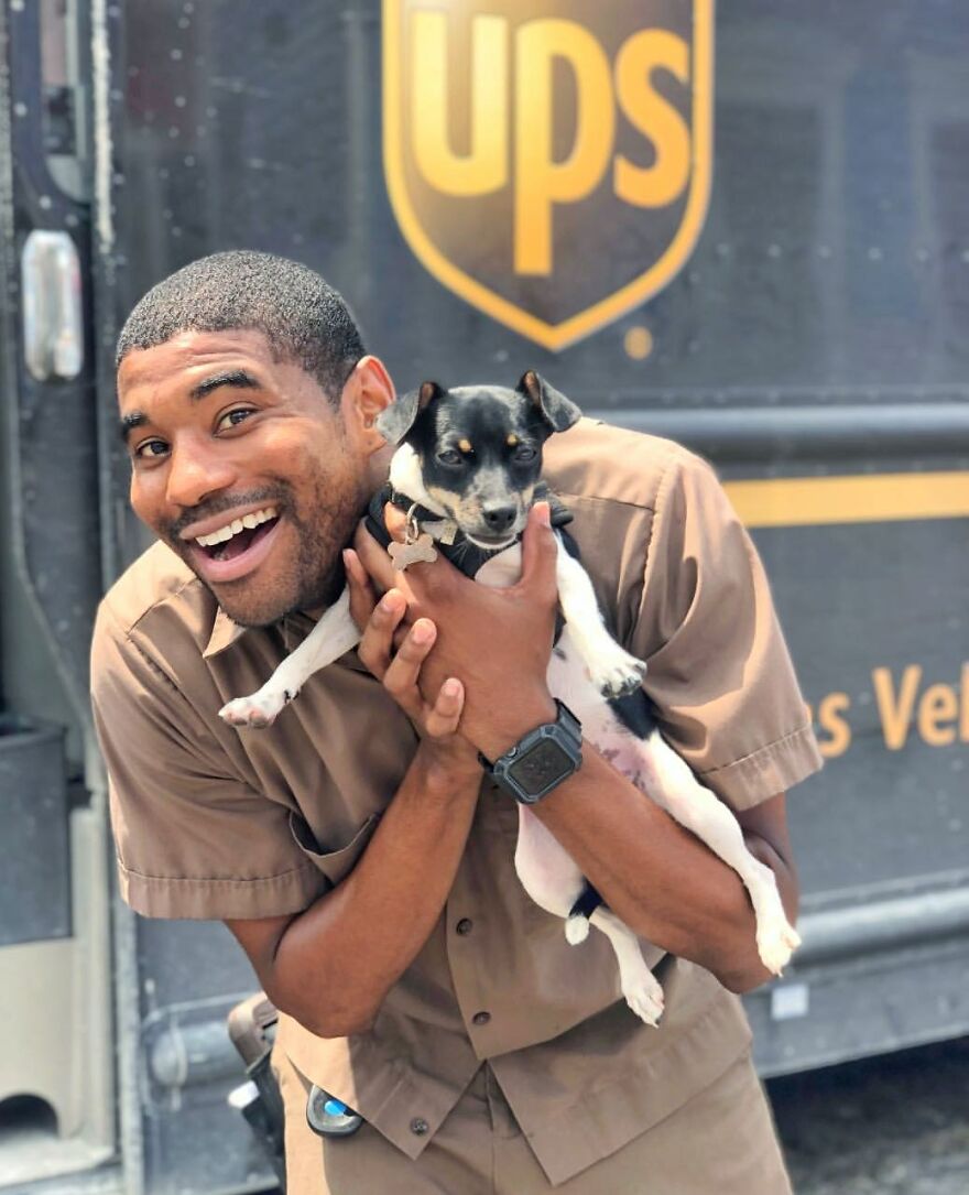 Delivery Man Continues To Take Breaks On The Way To Take Pictures And Pet The Dogs He Meets (New Pics)