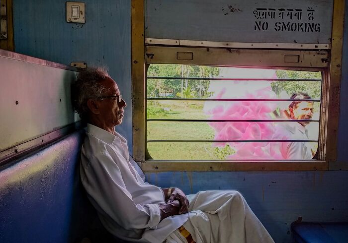 Man Traveling On Train In India