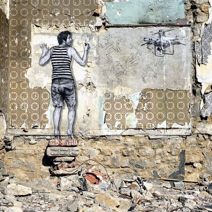 French Artist Brings Life To Buildings And Monotonous Objects On Parisian Streets With His Art