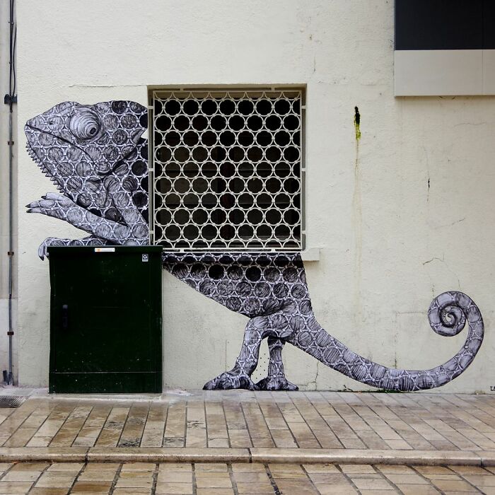 French Artist Brings Life To Buildings And Monotonous Objects On Parisian Streets With His Art