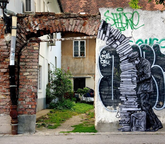 French Artist Brings Life To Buildings And Monotonous Objects On Parisian Streets With His Art