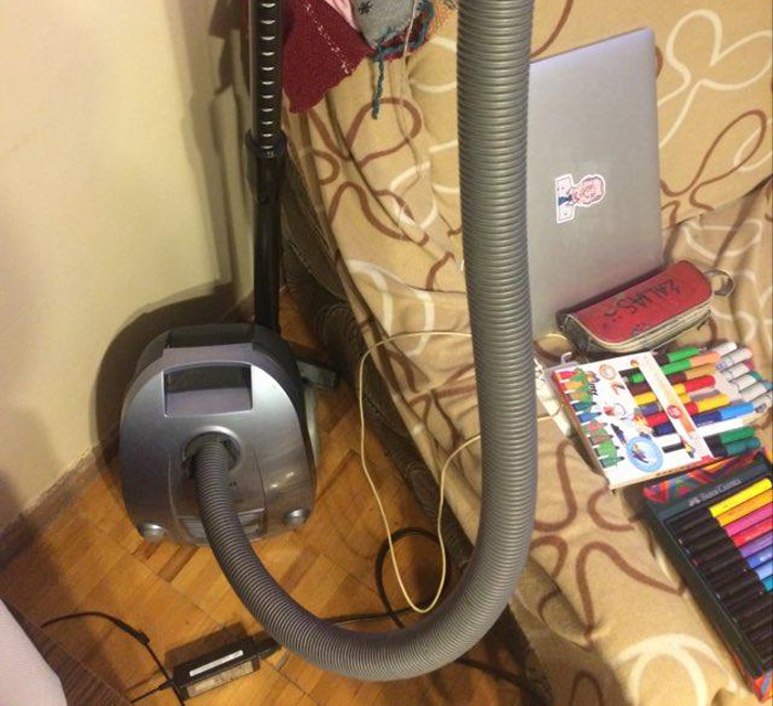 Vacuum Cleaner. We Prefer The Broom, As It Doesn't Scare The Cat