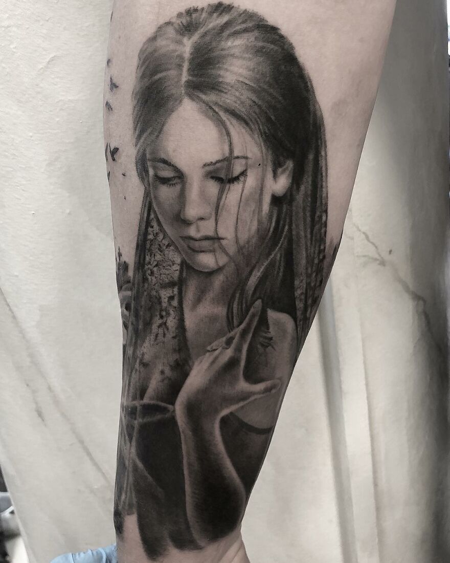 Black and gray realism tattoo of a woman on a forearm by Swedish artist.