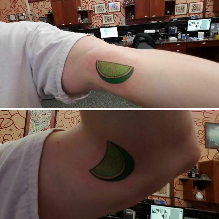 Creative tattoo of a lime slice transforming when the arm bends.