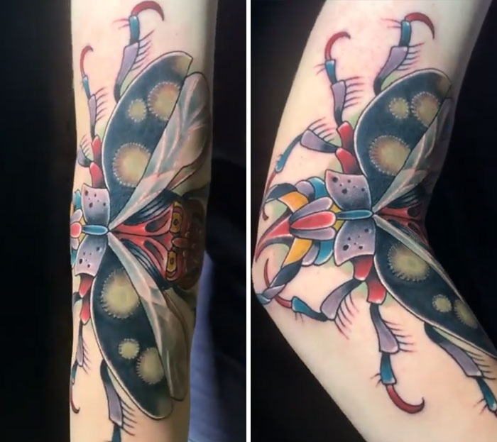 Creative tattoo of a butterfly transforming into a colorful creature when the arm bends.