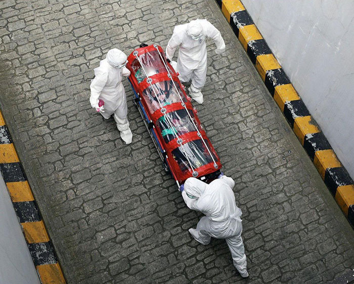 A Corona Patient Being Moved In Seoul. Picture Of An Era