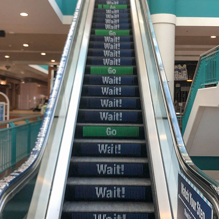 Social Distancing Escalator At Local Mall