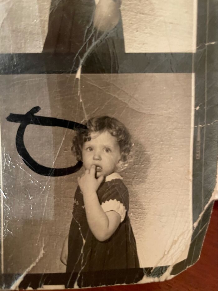 Red Curly Hair And Blue Eyes.