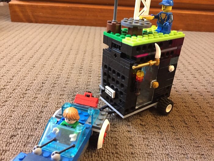 Caravan And Car, With A Bed, Desk, Toolbox, Table, Ladder And An Umbrella