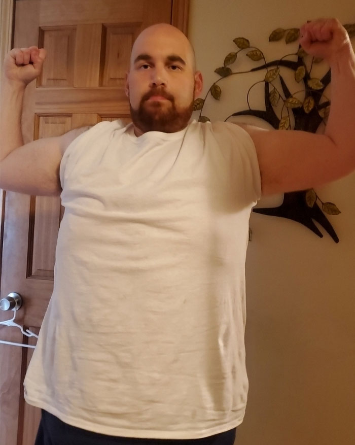 Guy Goes Viral For For His Transformation, Receives Hate Messages, Prints Them On A Shirt, Goes Viral Again