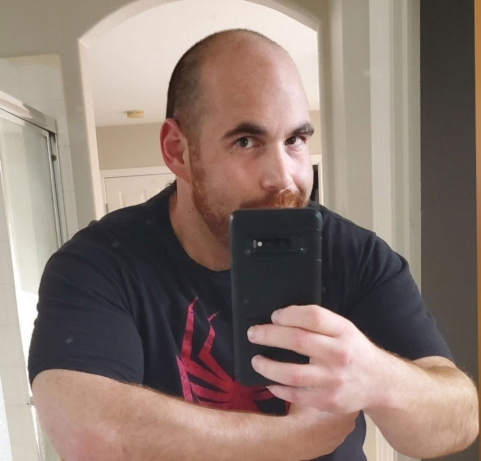 Guy Goes Viral For For His Transformation, Receives Hate Messages, Prints Them On A Shirt, Goes Viral Again