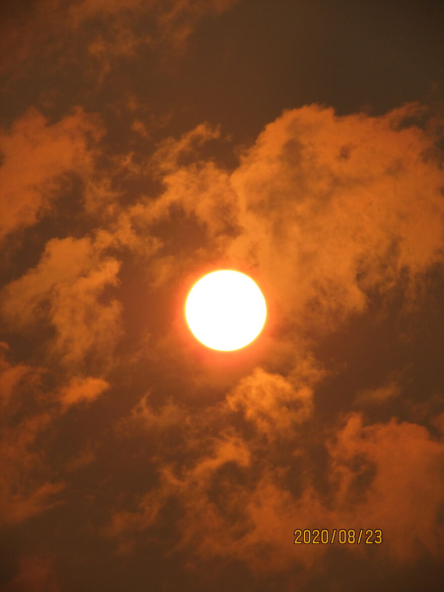 Clouds With Suns Refection