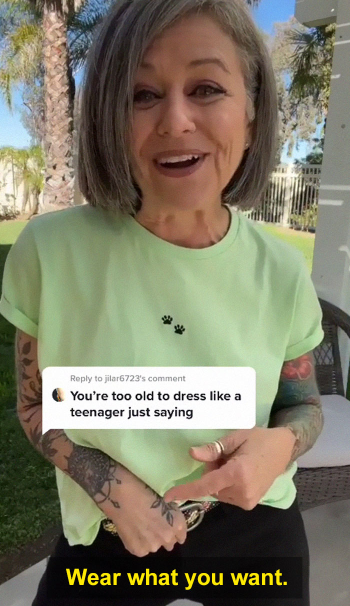 Woman in her 50s confidently responds to being told she's too old to dress like a teenager with her outfit and attitude. Woman in her 50s confidently responds to being told she's too old to dress like a teenager with her outfit and attitude.