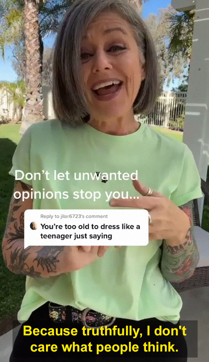 Woman in her 50s smiling outdoors, responding confidently to being told she&rsquo;s too old to dress like a teenager.