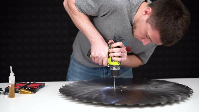Man Replaces Bike Tires With Circular Saws And Goes For A Spin On A Frozen Lake Man Replaces Bike Tires With Circular Saws And Goes For A Spin On A Frozen Lake
