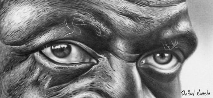 Realistic drawing of a man's intense eyes by Rafael Konishi.