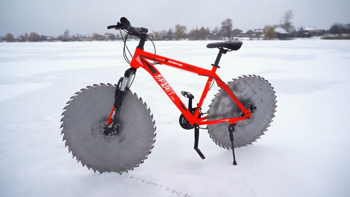 Man Replaces Bike Tires With Circular Saws And Goes For A Spin On A Frozen Lake Man Replaces Bike Tires With Circular Saws And Goes For A Spin On A Frozen Lake