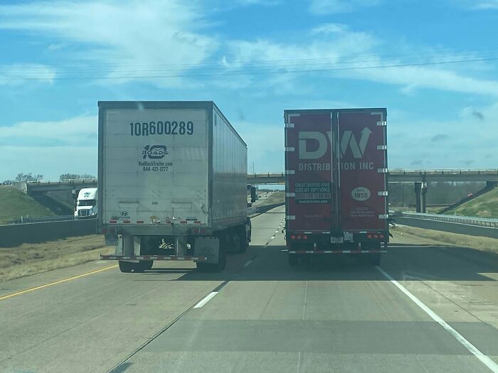 Tow Semi Trucks Driving 20 Mph Under The Speed Limit For 20 Minutes. At Least 50 Cars Jammed Behind Them!