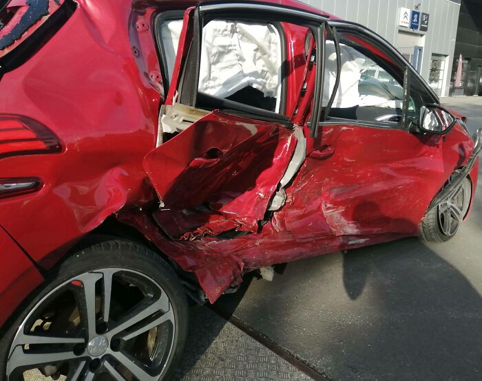 My Car After I Got Hit By A Porsche Panamera. He Was Drunk And Was Speeding. Yet The Insurance Blames Me Cause I Was Doing A Manouver To My Driveway. Financially Destroyed