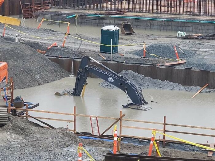 Excavator At A Construction Site Got A Bit Of Water Damage Last Night